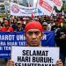 GEMA PERLAWANAN DARI GERBANG TIMUR: MENYOAL KRISIS KAPITALISME GLOBAL DAN NASIB BURUH DI TENGAH BADAI PHK 2026