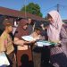 Sukseskan Program GEMAR Bupati Maros, Ayah di SDN 234 Barambang Antusias Ambil Rapor Anak